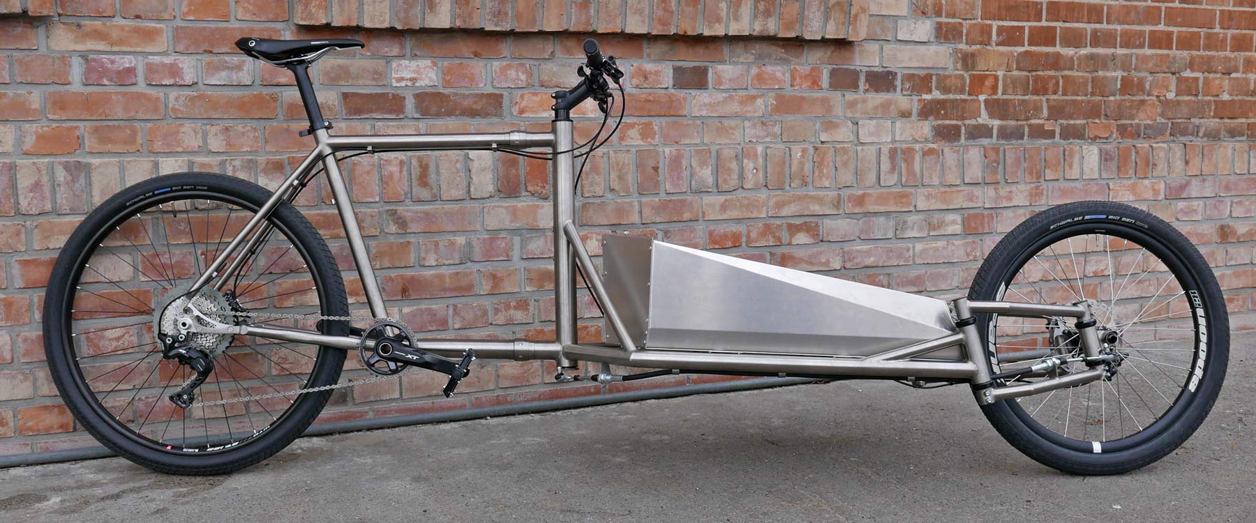 Catan-titanium-Cargobike_lightweight-mixed-surface-gravel-cargo-bike_unique-linkage-arm-steering_engineered-flex_complete.jpg